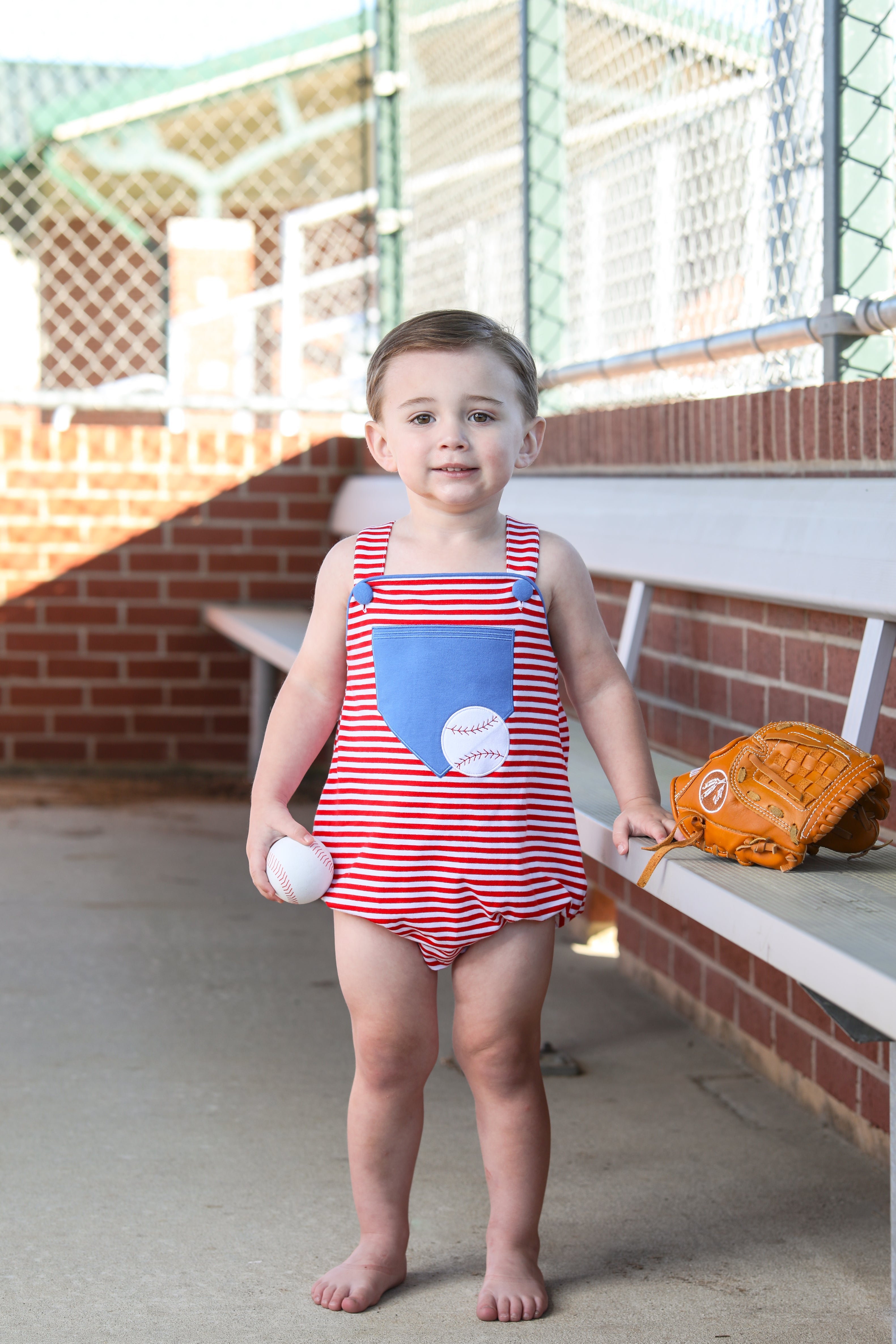 Baseball Pocket Sunsuit by Trotter Street.
