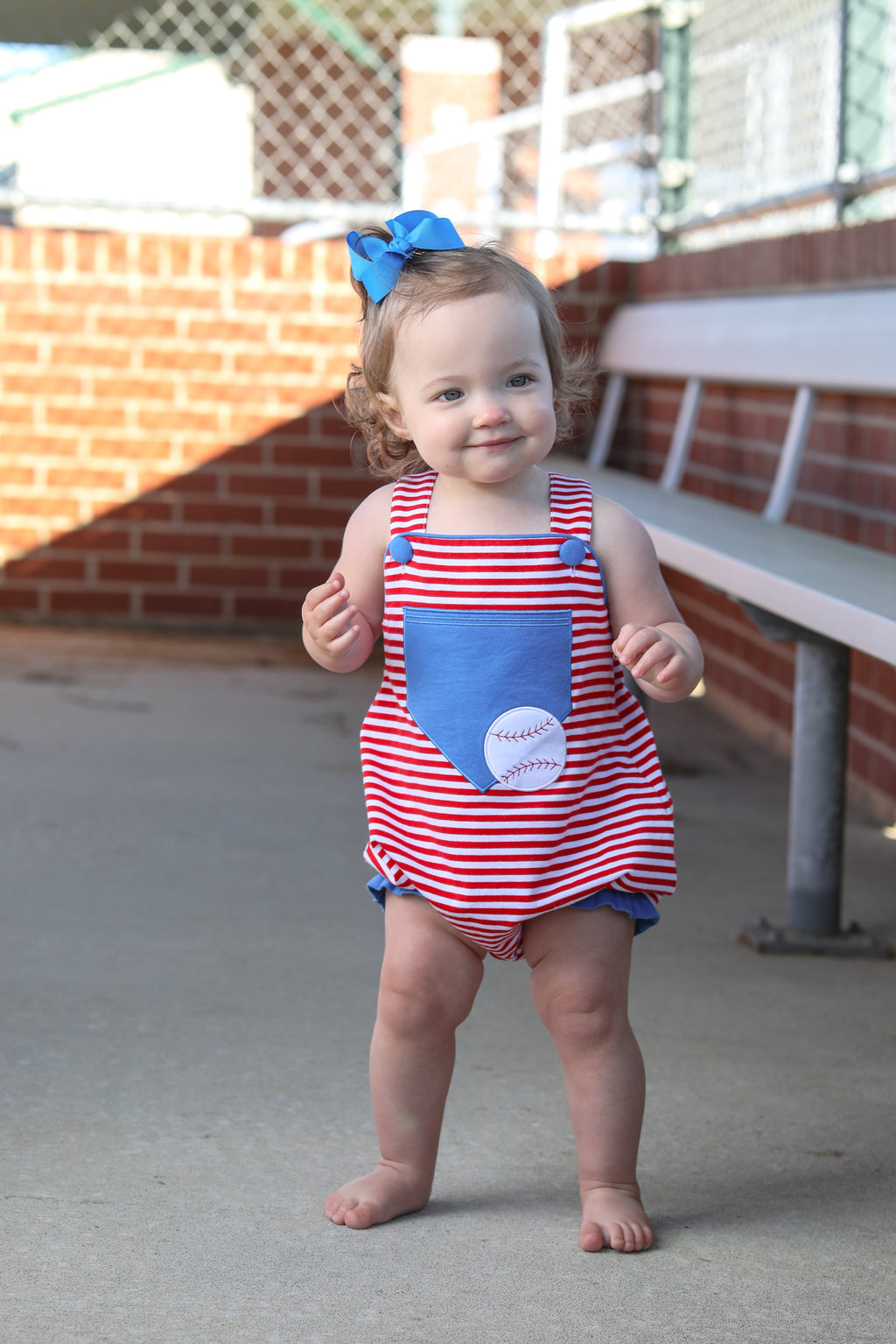 Baseball Pocket Ruffle Sunsuit by Trotter Street
